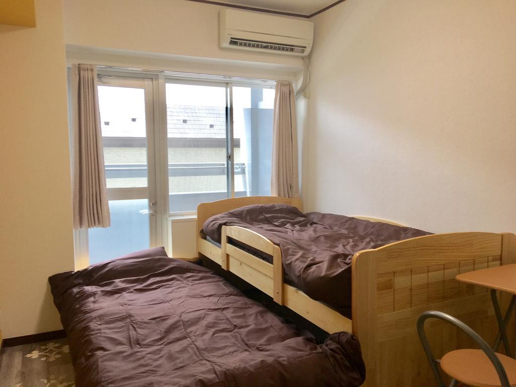 Guesthouse Origami Hiroshima Exterior foto